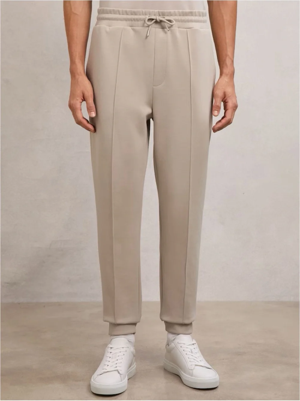 REISS Premier Premium Interlock-Jersey Joggers in Stone - Picture 1 of 8